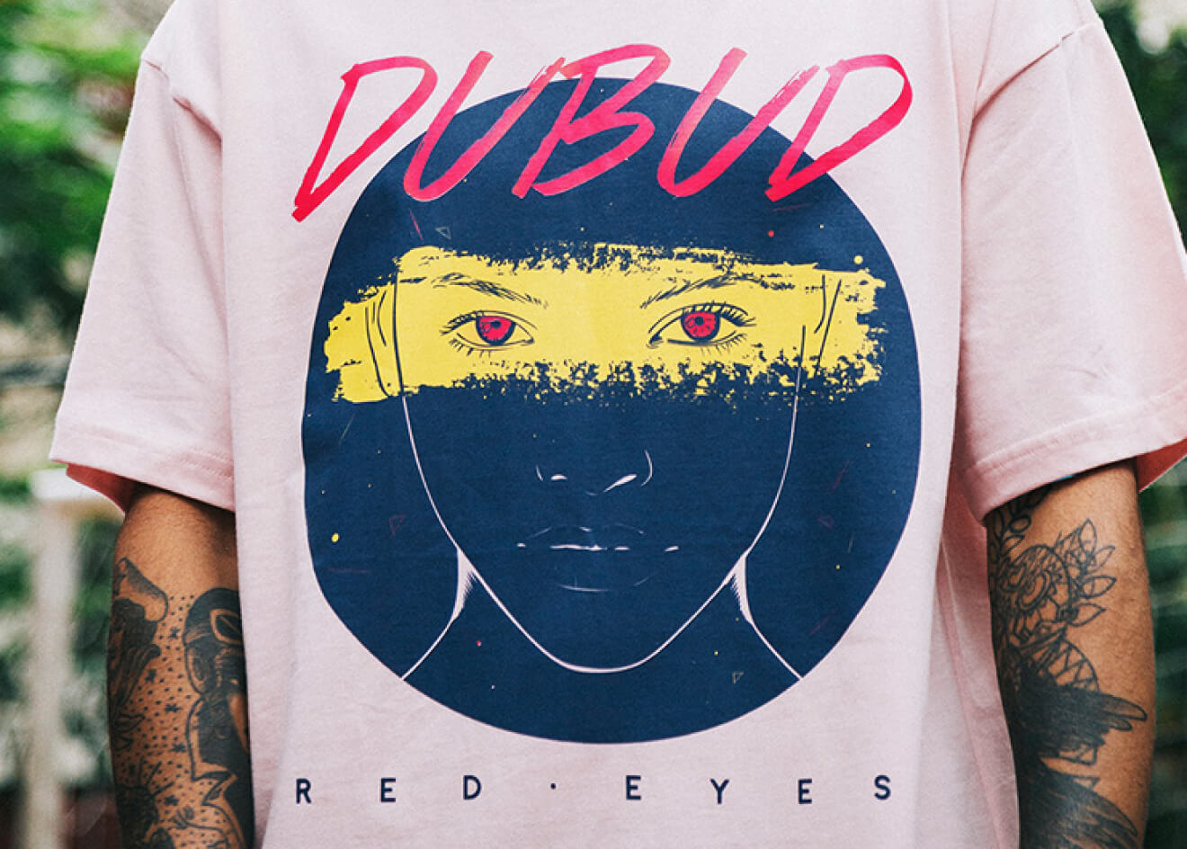 Dubud — Red Eyes print on a pink tee