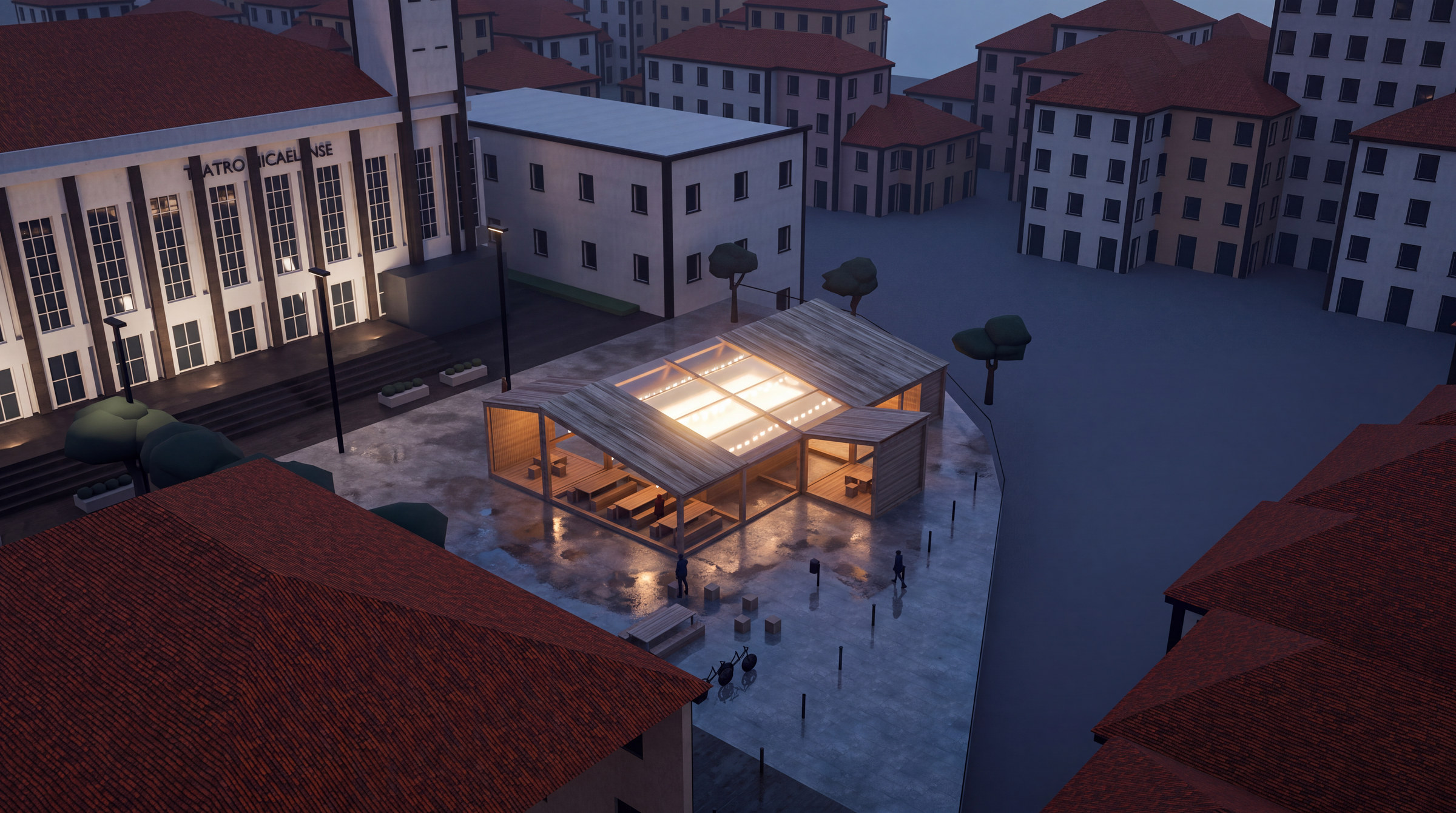 Aerial view of Largo de São João at blue hour with the lit pavilion and the Teatro Micaelense.