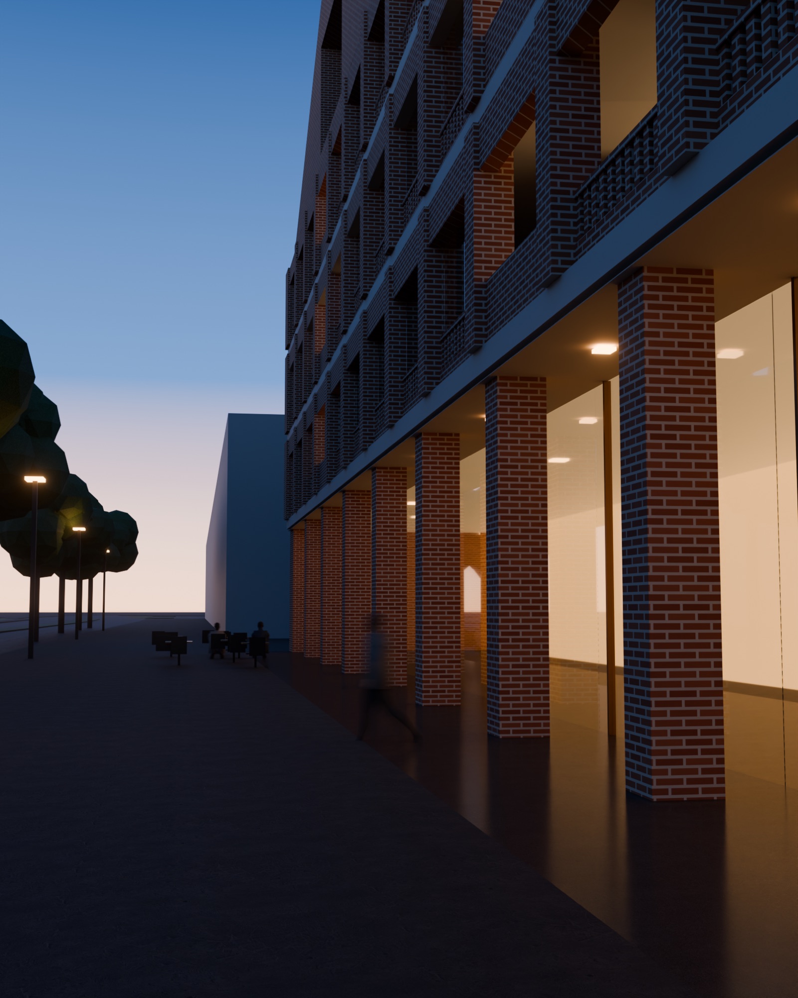 The brick arcade along Bellerivestrasse at blue hour, looking towards Tiefenbrunnen station