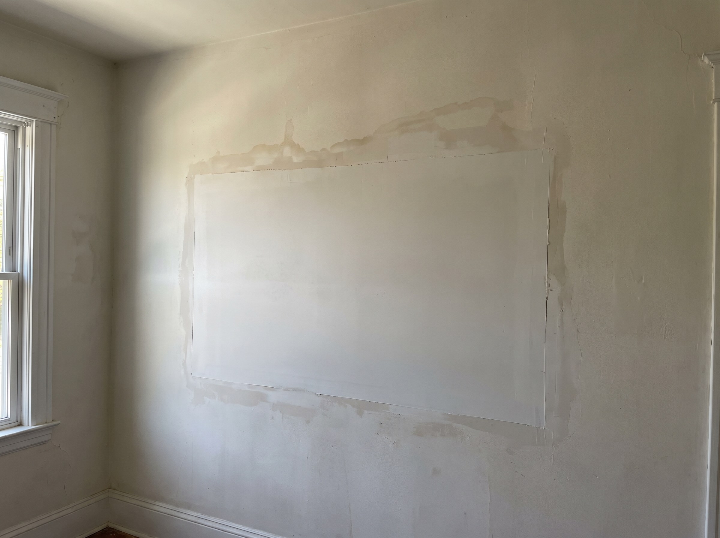 Wall section replaced and refinished after a leak