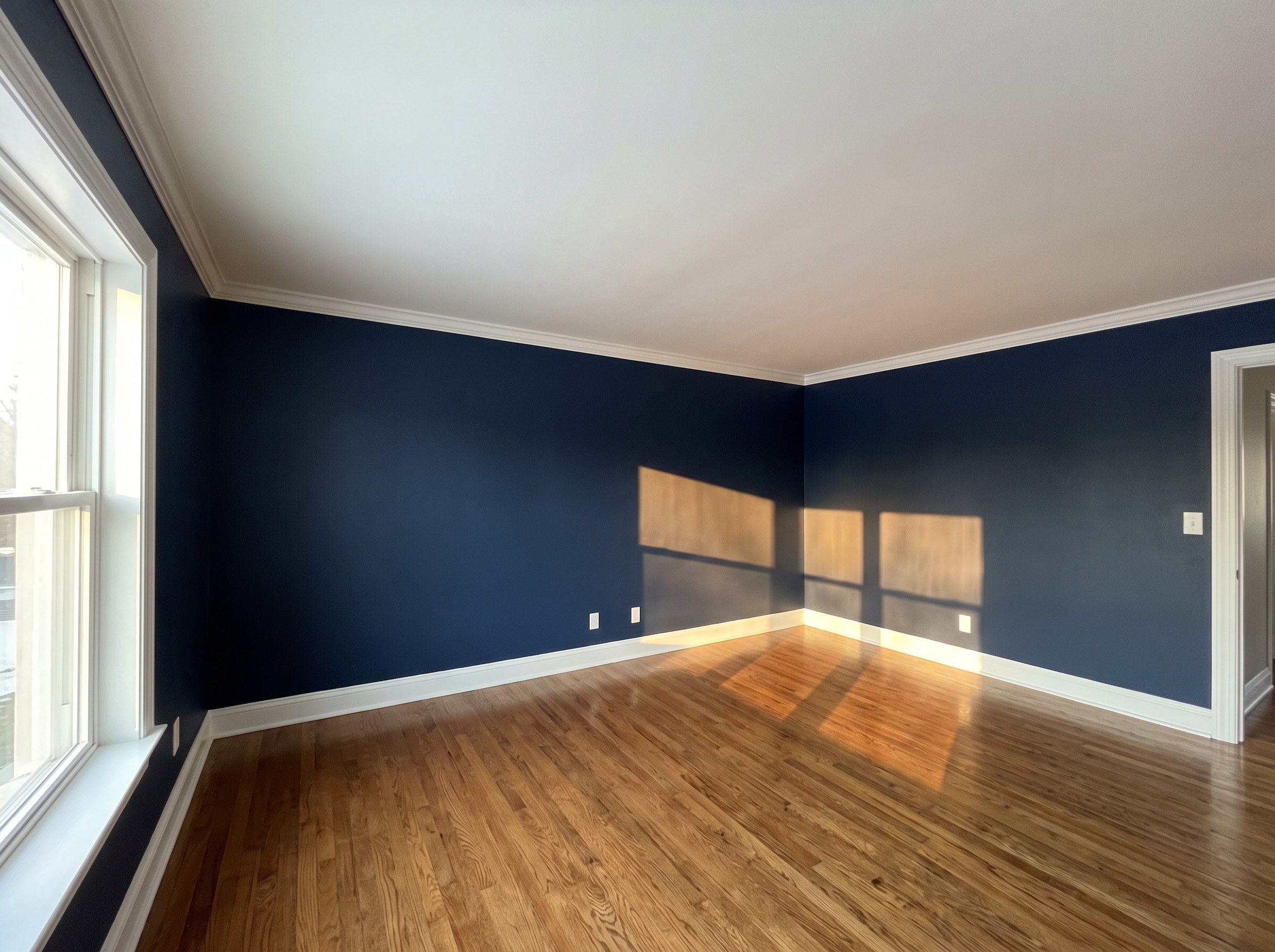 Entryway with freshly painted walls and trim