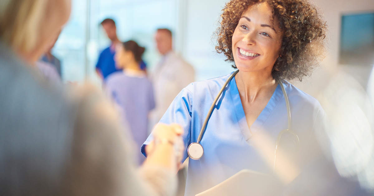 A nurse greeting a patient