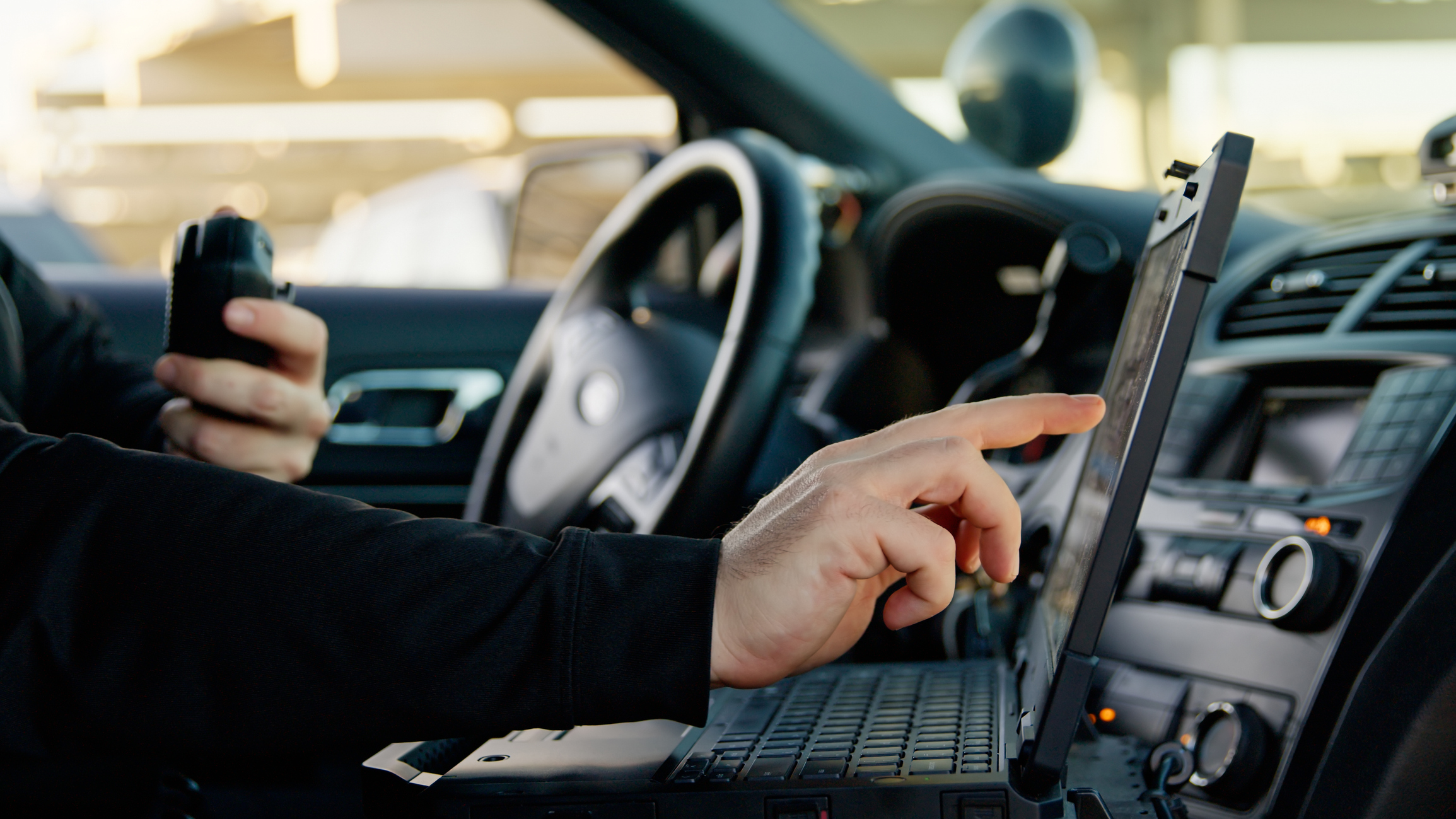 A laptop mounted in a police vehicle