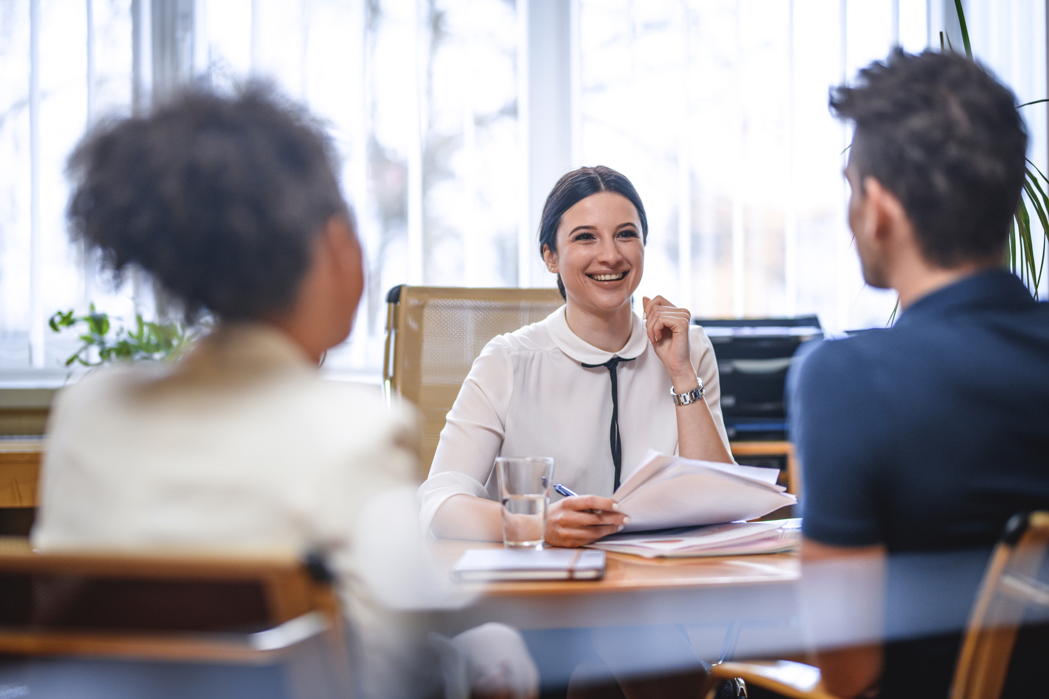 An attorney meeting with clients