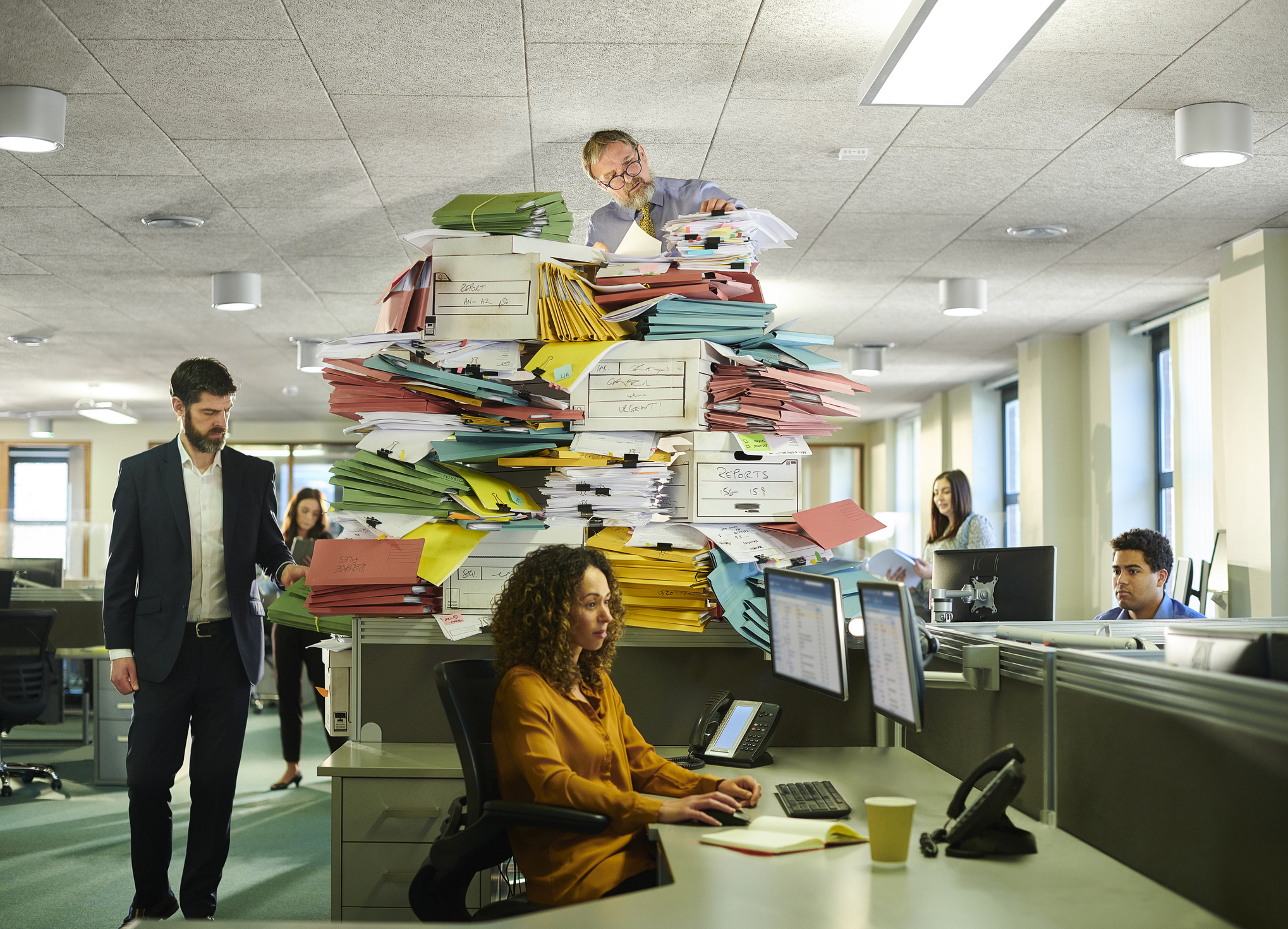 Tax season paperwork on an accountant’s desk