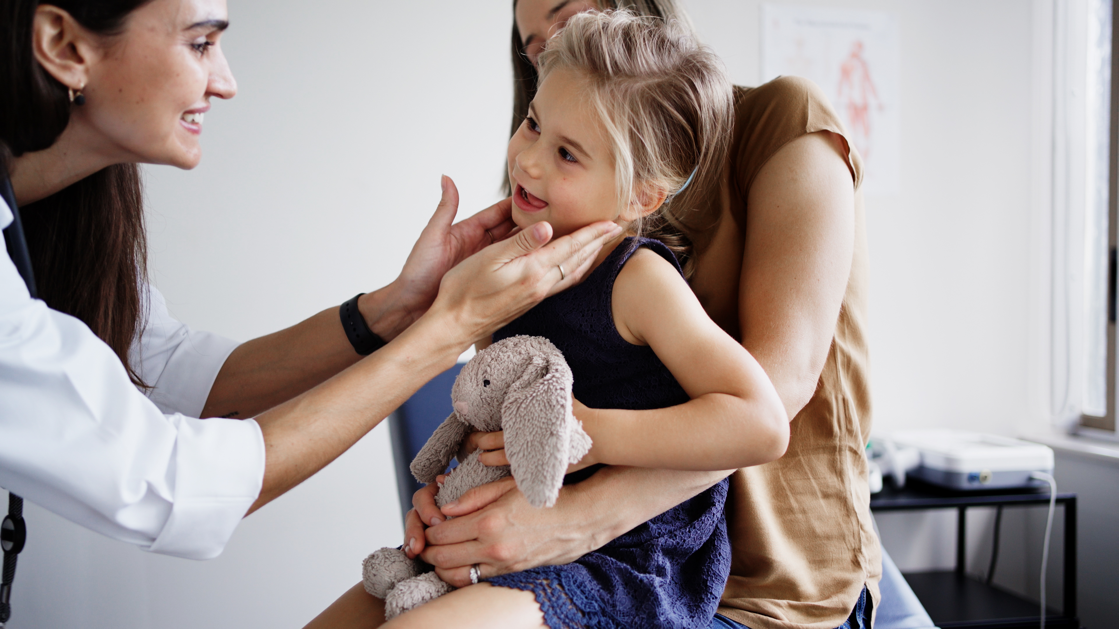 A doctor with a young patient