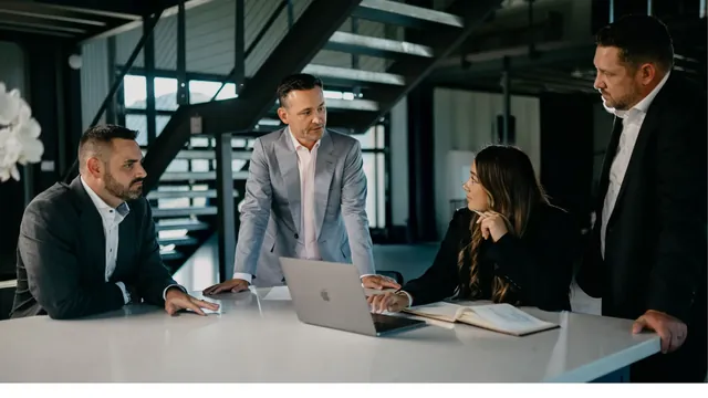 The May Firm legal team meeting with a client