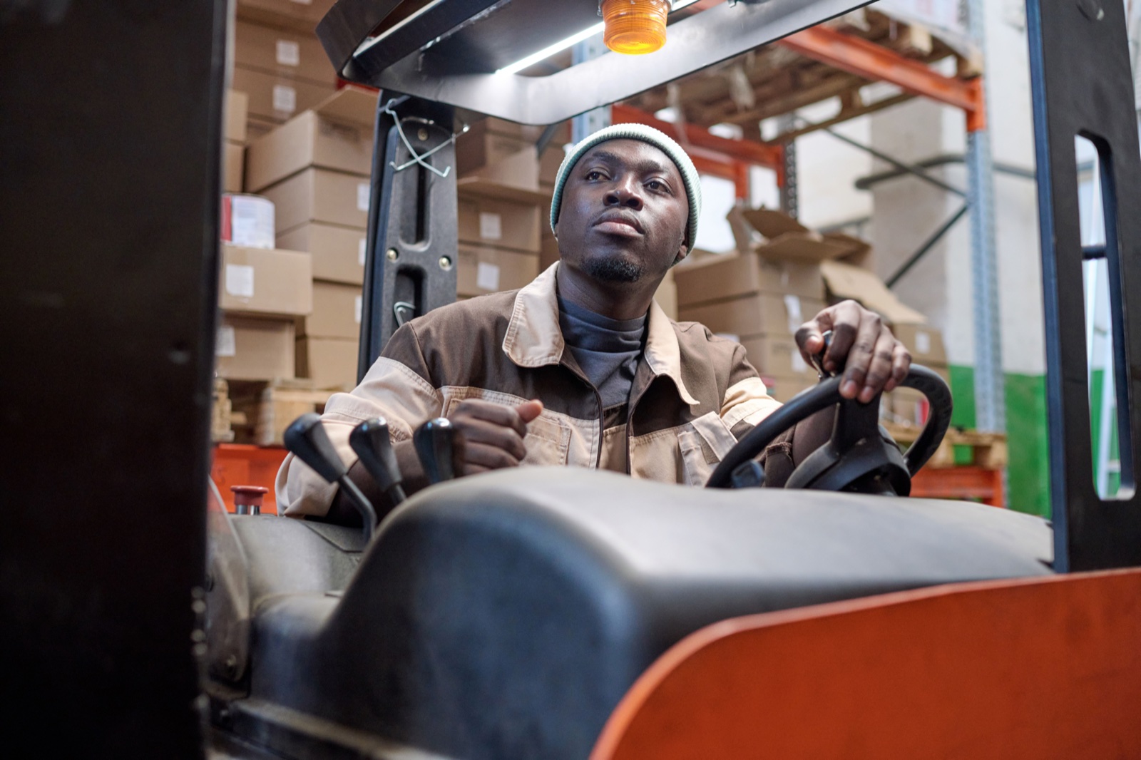 Warehouse worker reviewing inventory