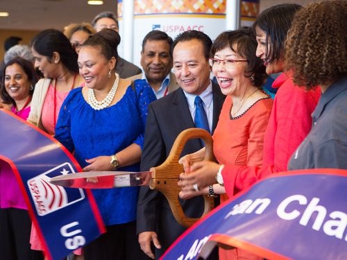 Ribbon cutting at a USPAACC event