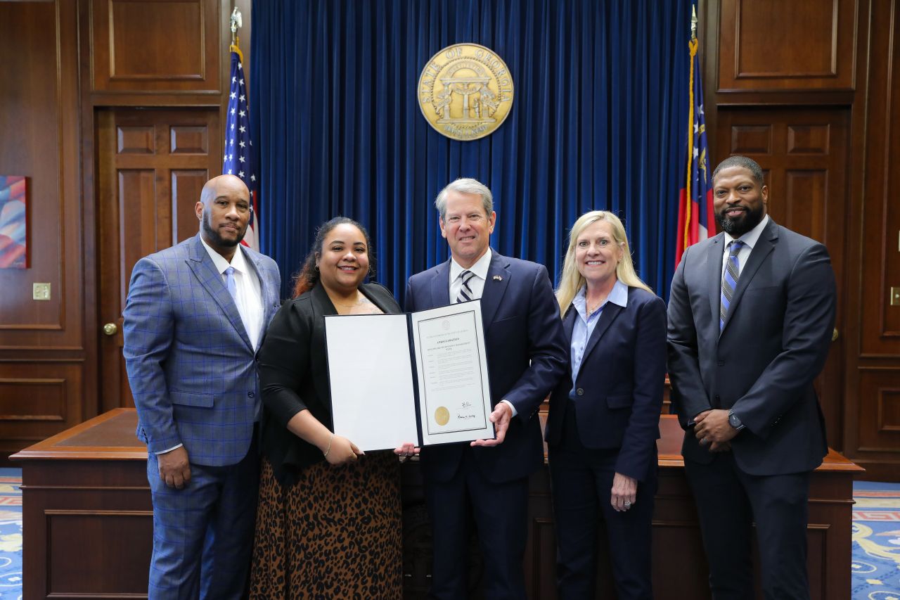 Governor Kemp and htm-ga team posing