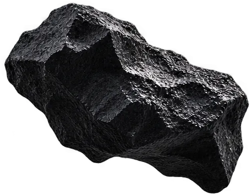 Rough, irregularly shaped dark black rock with a textured surface, lit to highlight its rugged contours against a dark background.