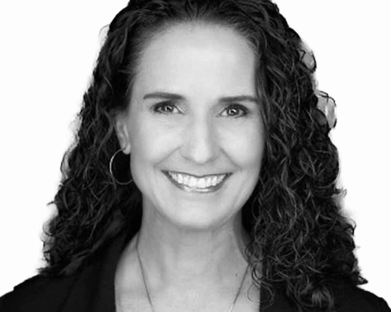 Black and white portrait of Tammy "G." Barlette, keynote speaker and mindset coach at VMax Group