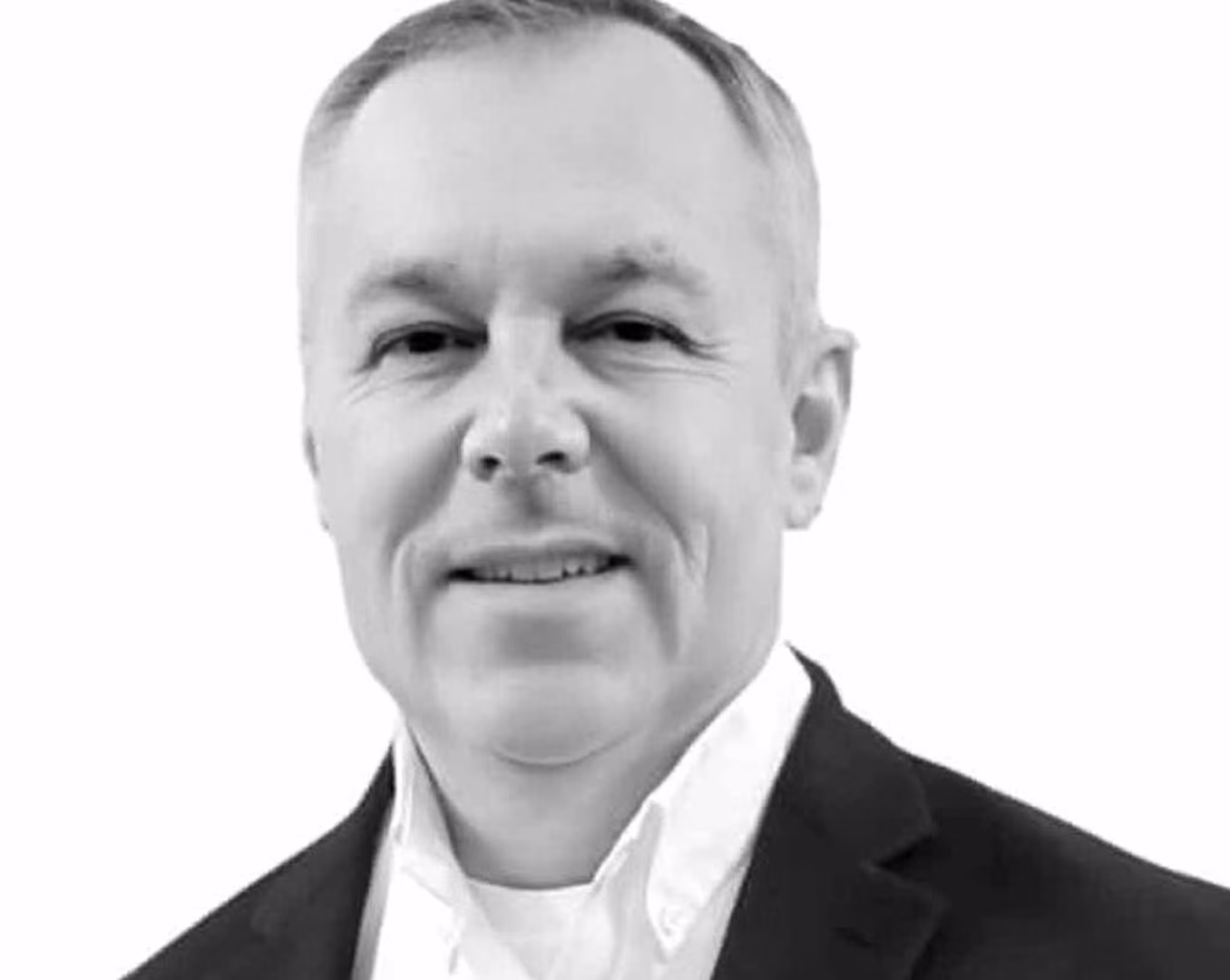 Black and white portrait of Robert "Shark" Garland, keynote speaker and workshop leader at VMax Group
