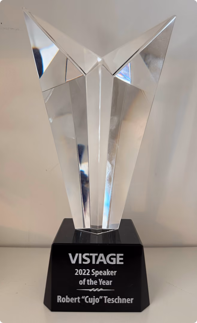 Vistage 2022 Speaker of the Year crystal award presented to Robert "Cujo" Teschner