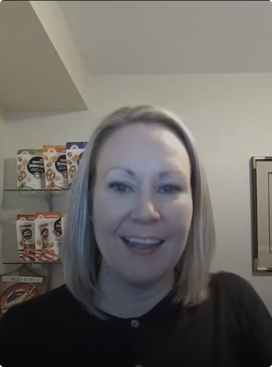 Colleen Rintamaki, Director of Sales at Three Farmers, speaking on camera about Top Gun Teamwork