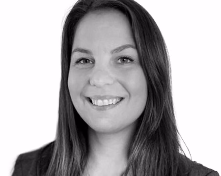 Black and white portrait of Tara Plechavy, Head of Team Operations and Special Projects at VMax Group