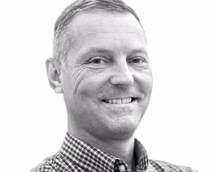 Black and white portrait of Brian "Stickit" Emme, workshop leader and presenter at VMax Group