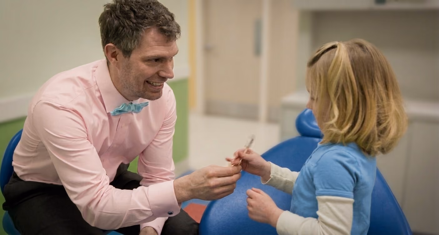 doctor talking with little patient