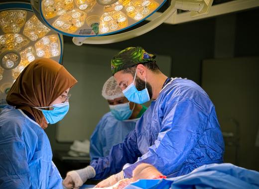 A FAJR surgical team at work in an operating theatre.