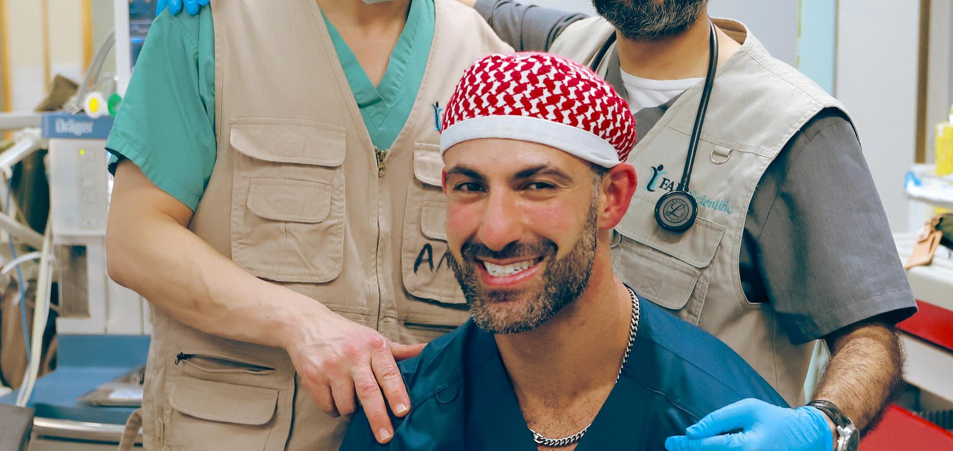 FAJR Global volunteer surgeons together after a mission operation.