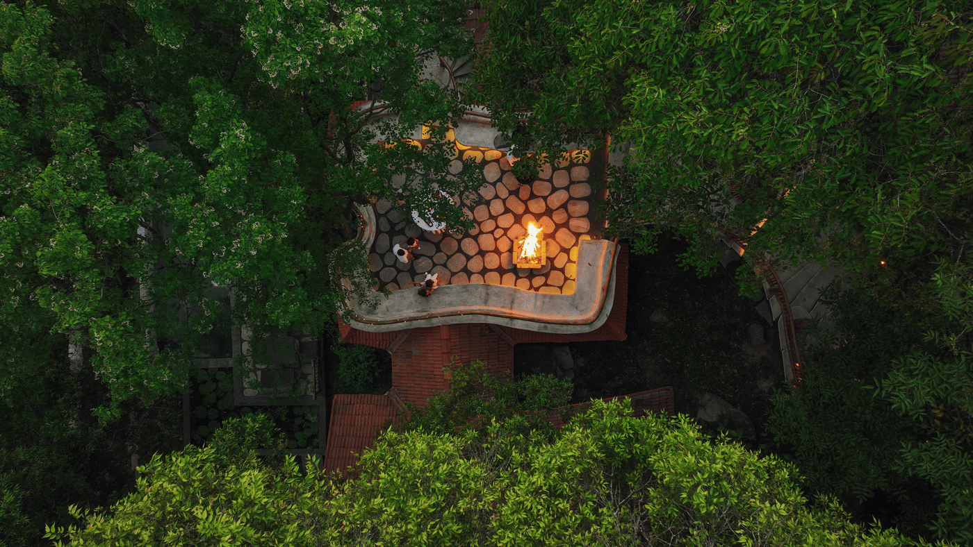 Aerial view of a deck set within the forest
