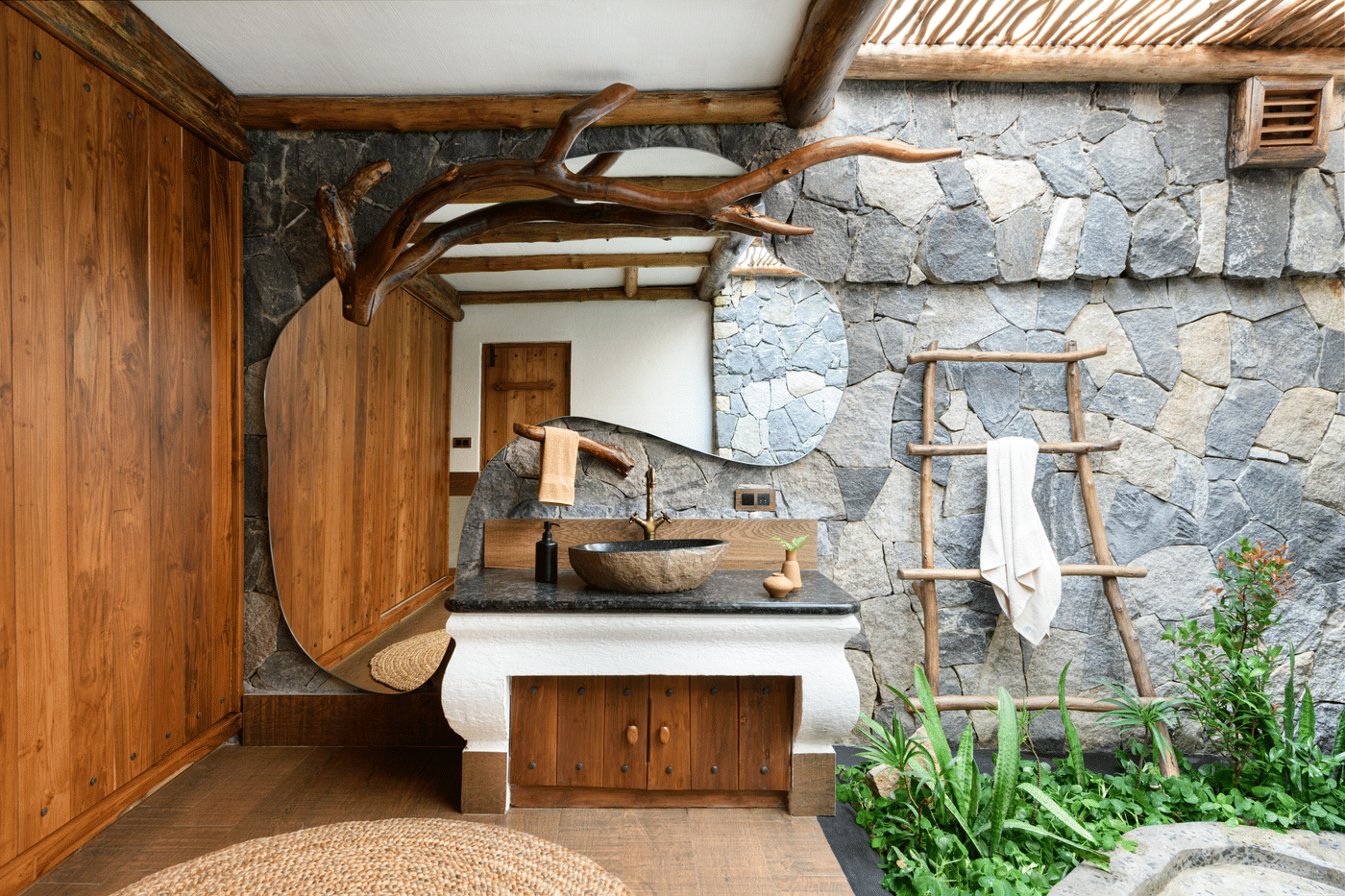 Second bathroom at Estate Plavu, walled in rough stone