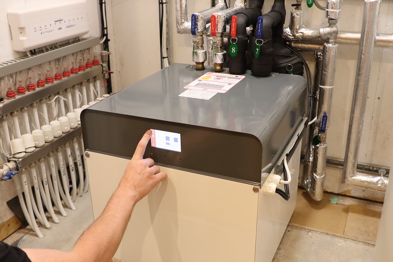 Off-grid bungalow with a compact ground source heat pump installation.