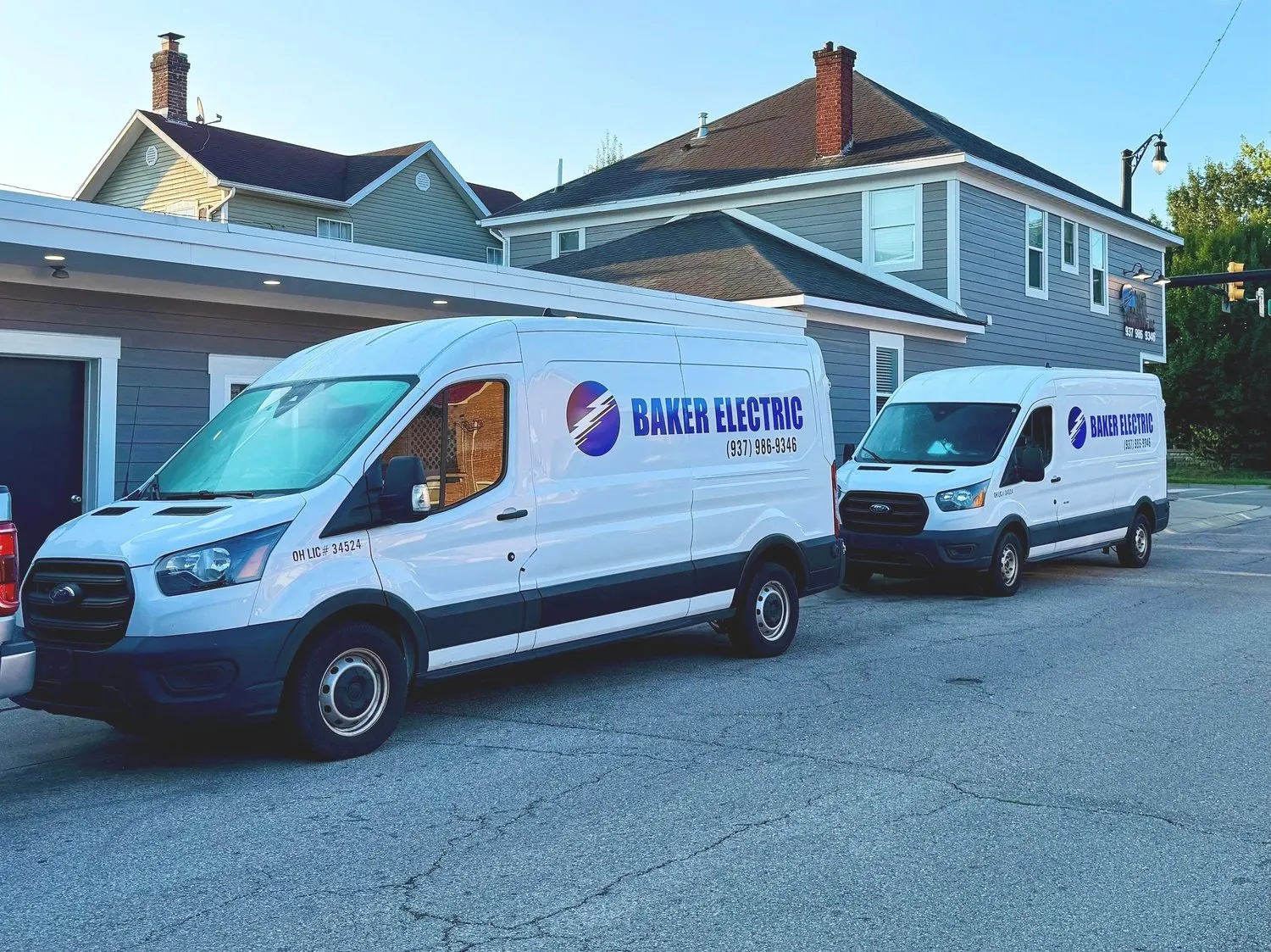 Picture of 2 Baker Electric white fleet vehicles