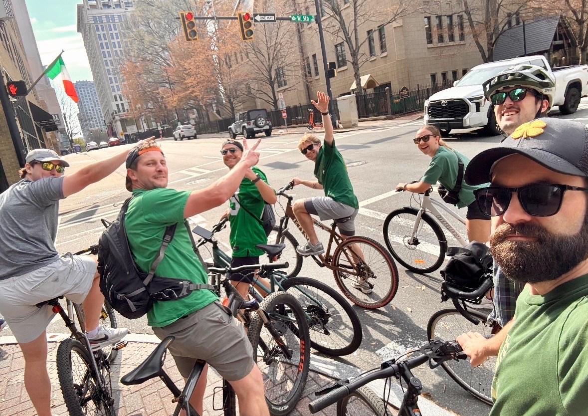 RSM& team members on a group bike ride through uptown Charlotte