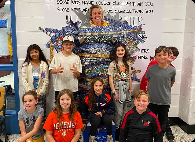 Students celebrate their fundraiser.