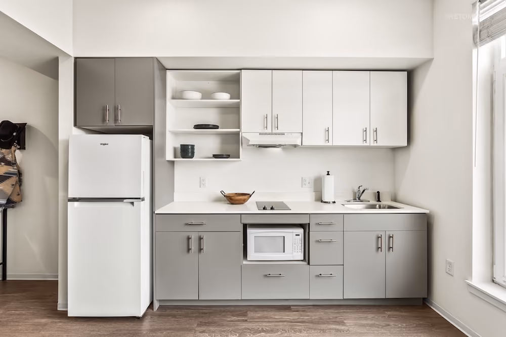 Modern kitchenette with open shelving at Koz on State in Salem, Oregon