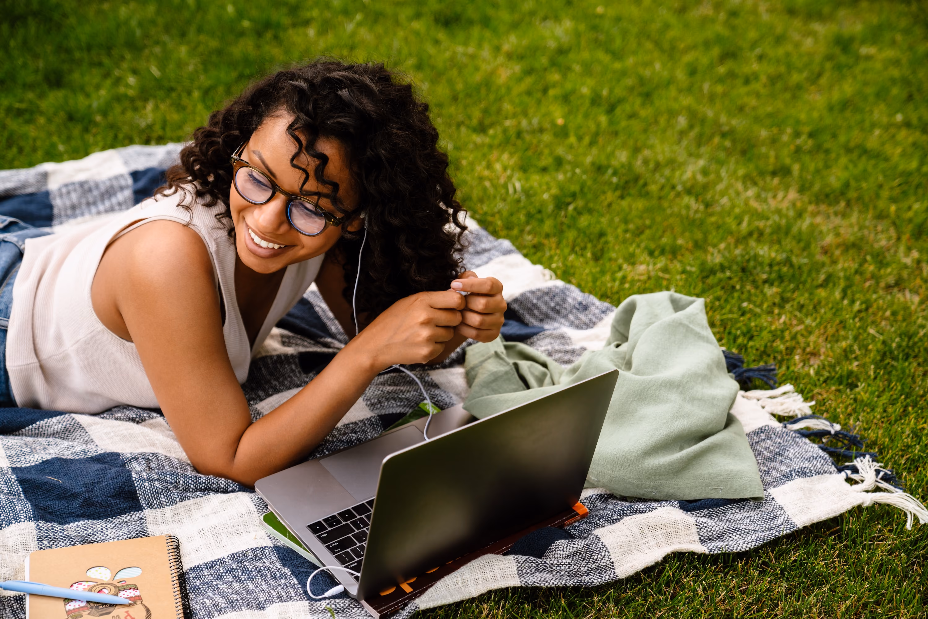 Person laying in grass stock image