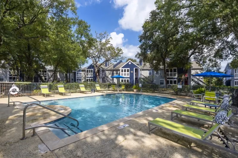 Pool with patio furniture