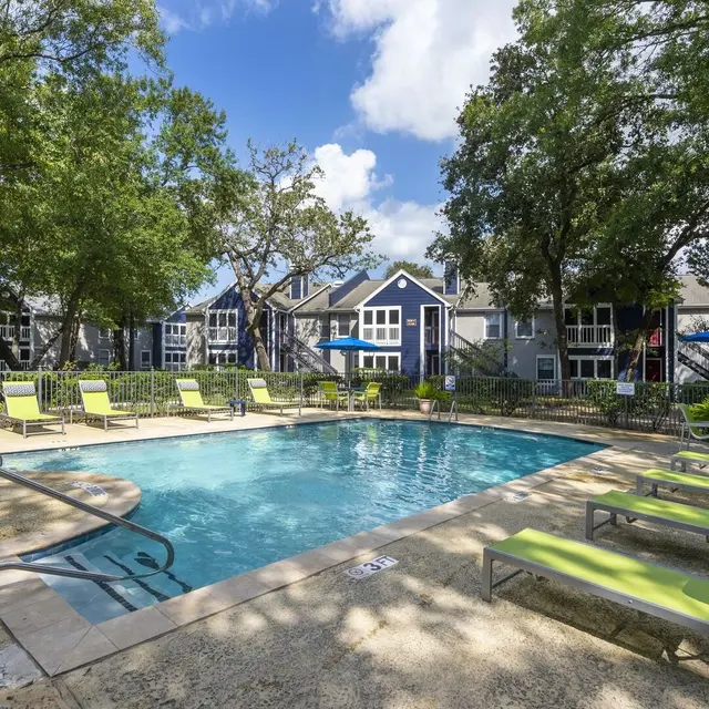 Pool with patio furniture