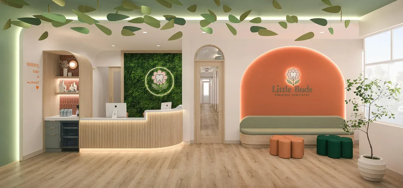 Bright reception area with a wood-slat desk and green living wall