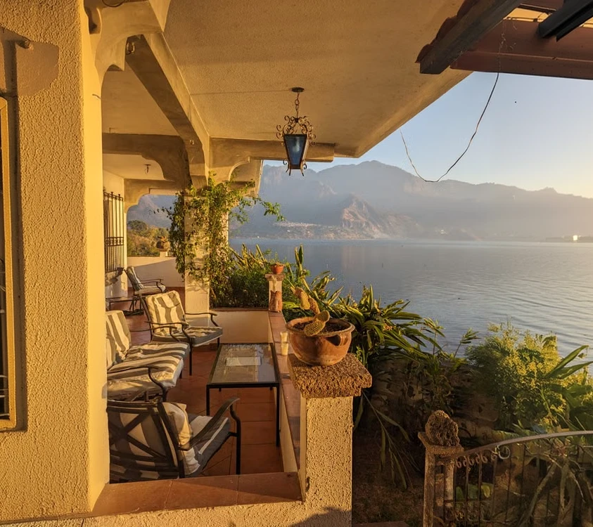 Lakeside terrace overlooking the water and mountains