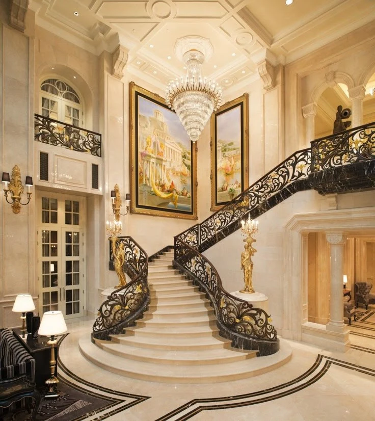 Hotel interior with chandelier and ornate staircase