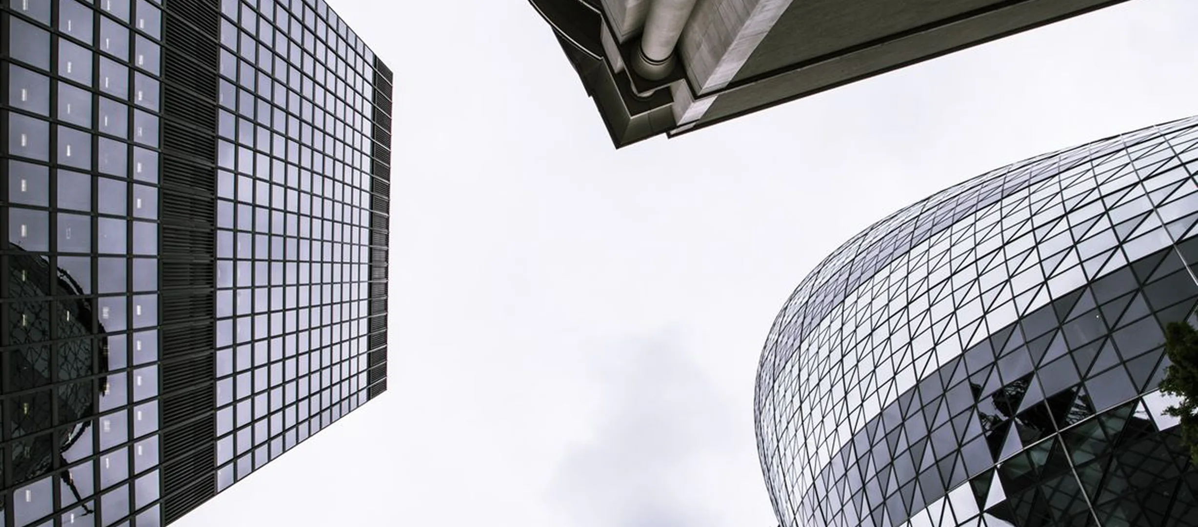 Modern glass buildings viewed from below