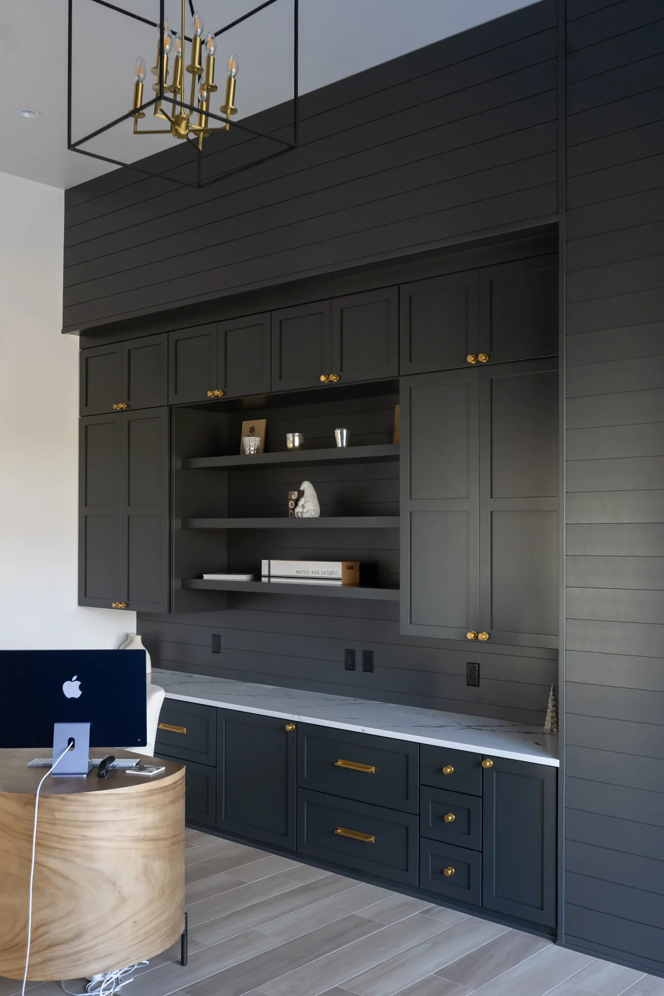 Charcoal home office built-ins with open shelving and drawers