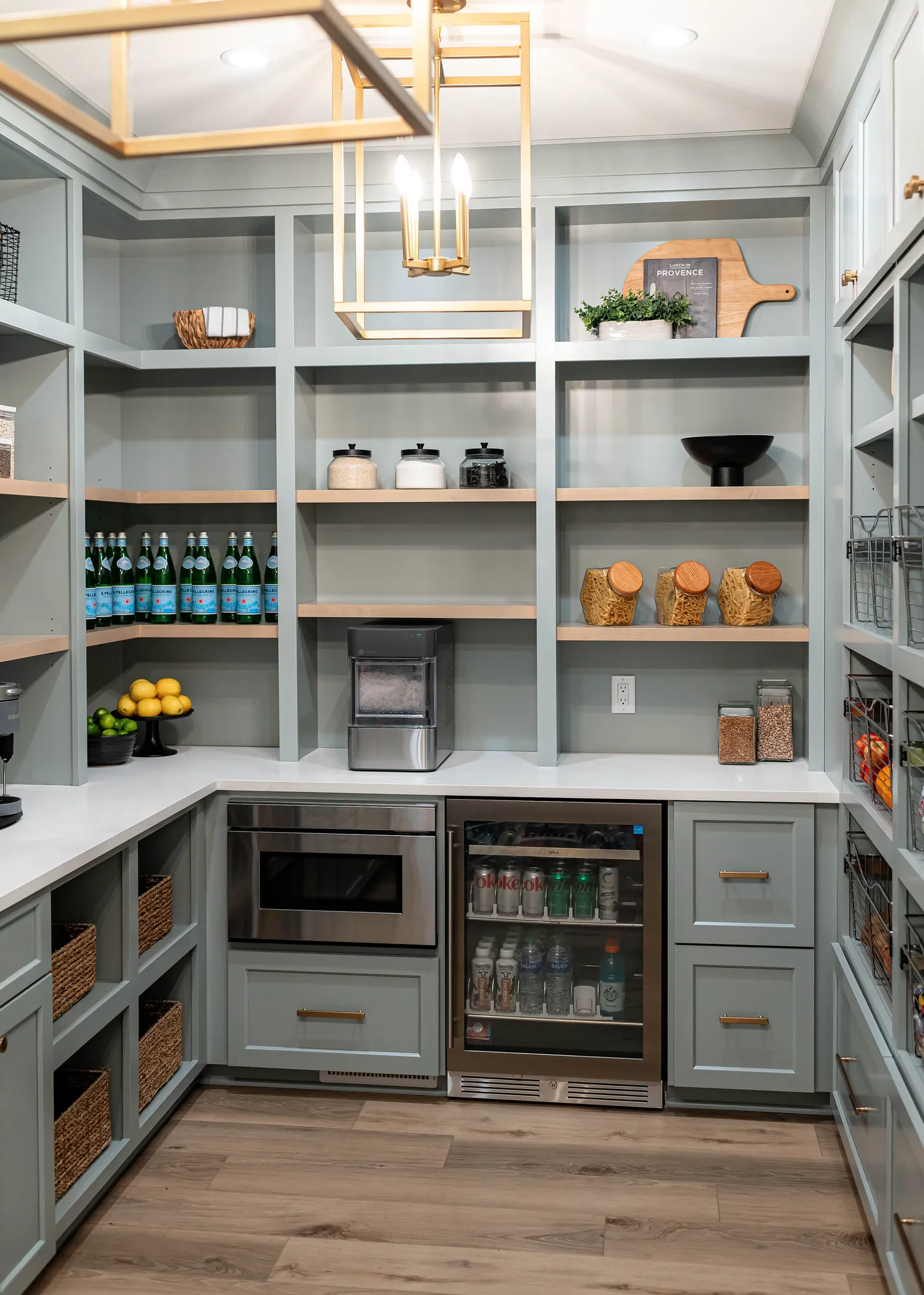 Walk-in pantry with painted cabinetry, open shelving and a beverage fridge