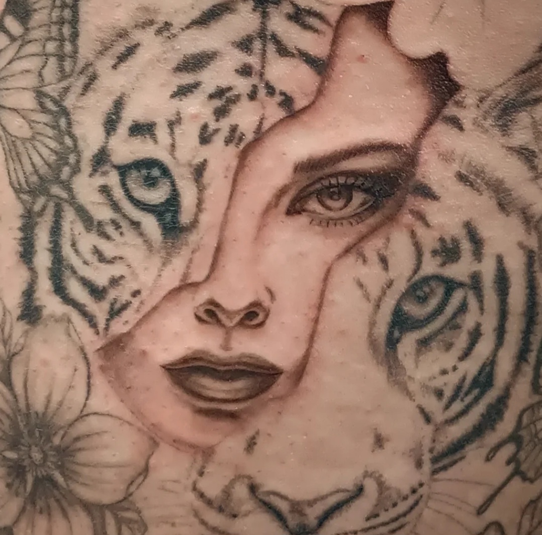 Woman and tiger portrait tattoo by Ramona at Lady Ink