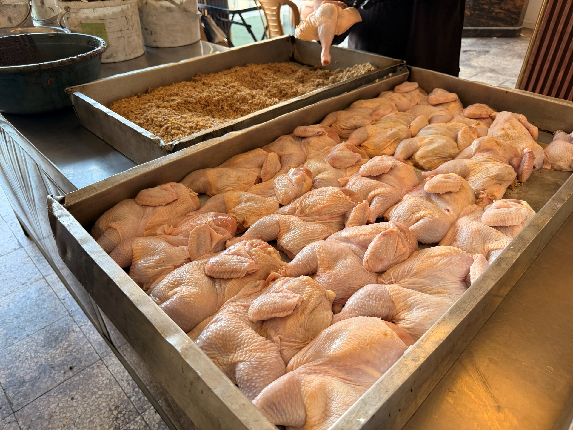 Raw chicken prepared for cooking in Gaza