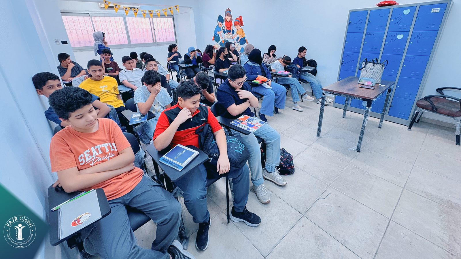 Students working at their desks in a FAJR classroom