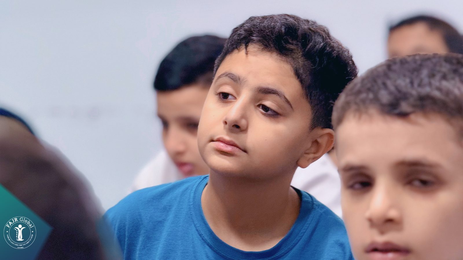 Palestinian boys listening during a lesson