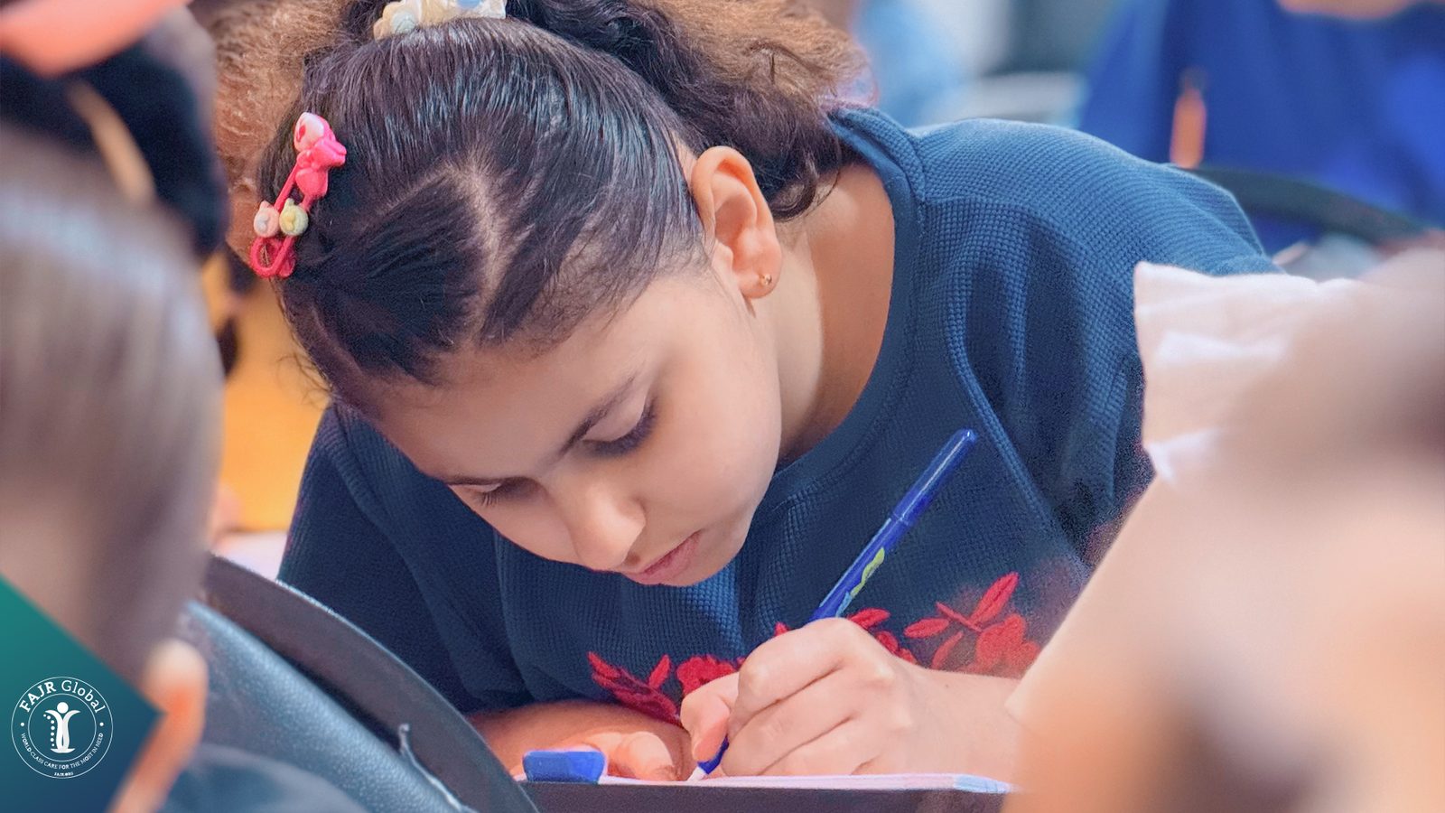 A girl concentrating on her work