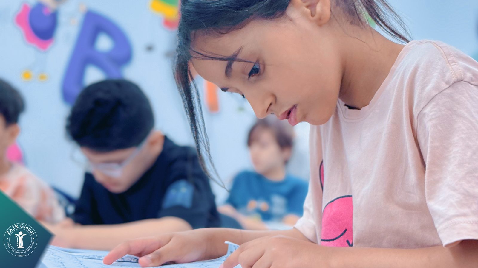 Students writing during a lesson