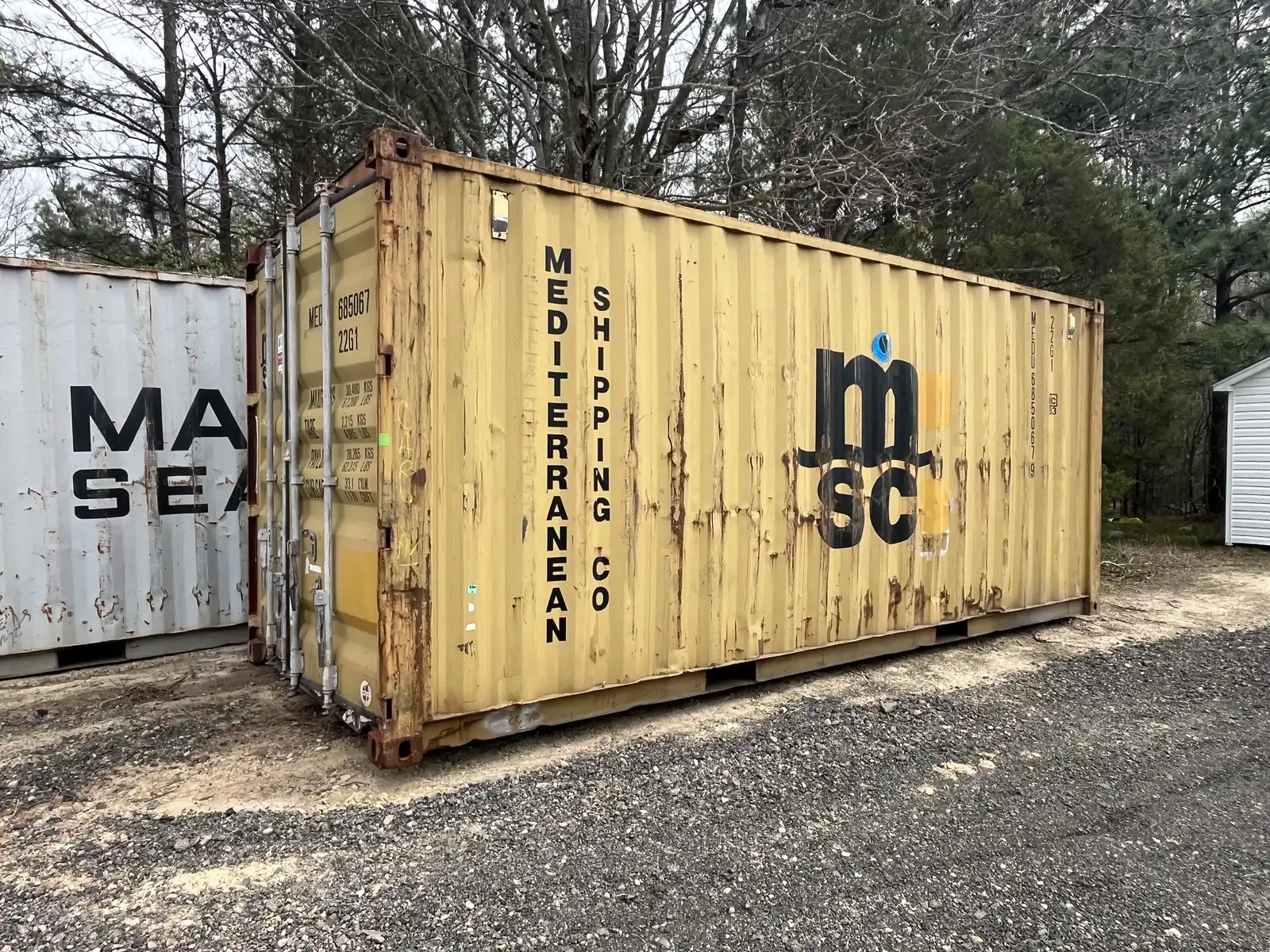 Used wind and water tight shipping container on a Virginia farm