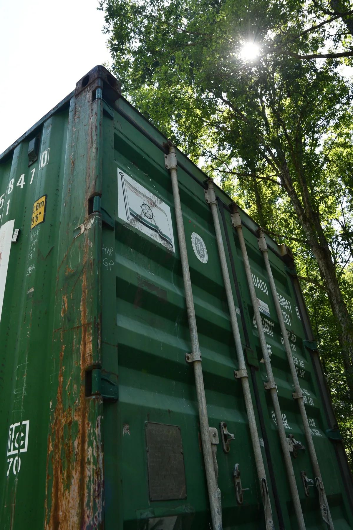 Cargo door end of a container showing locking bars, handles and hinges