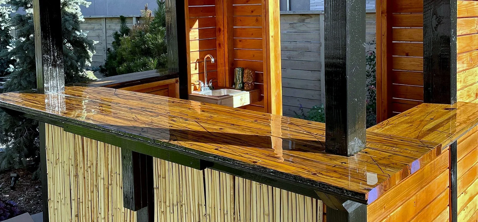 Outdoor tiki bar built from reclaimed hardwood.