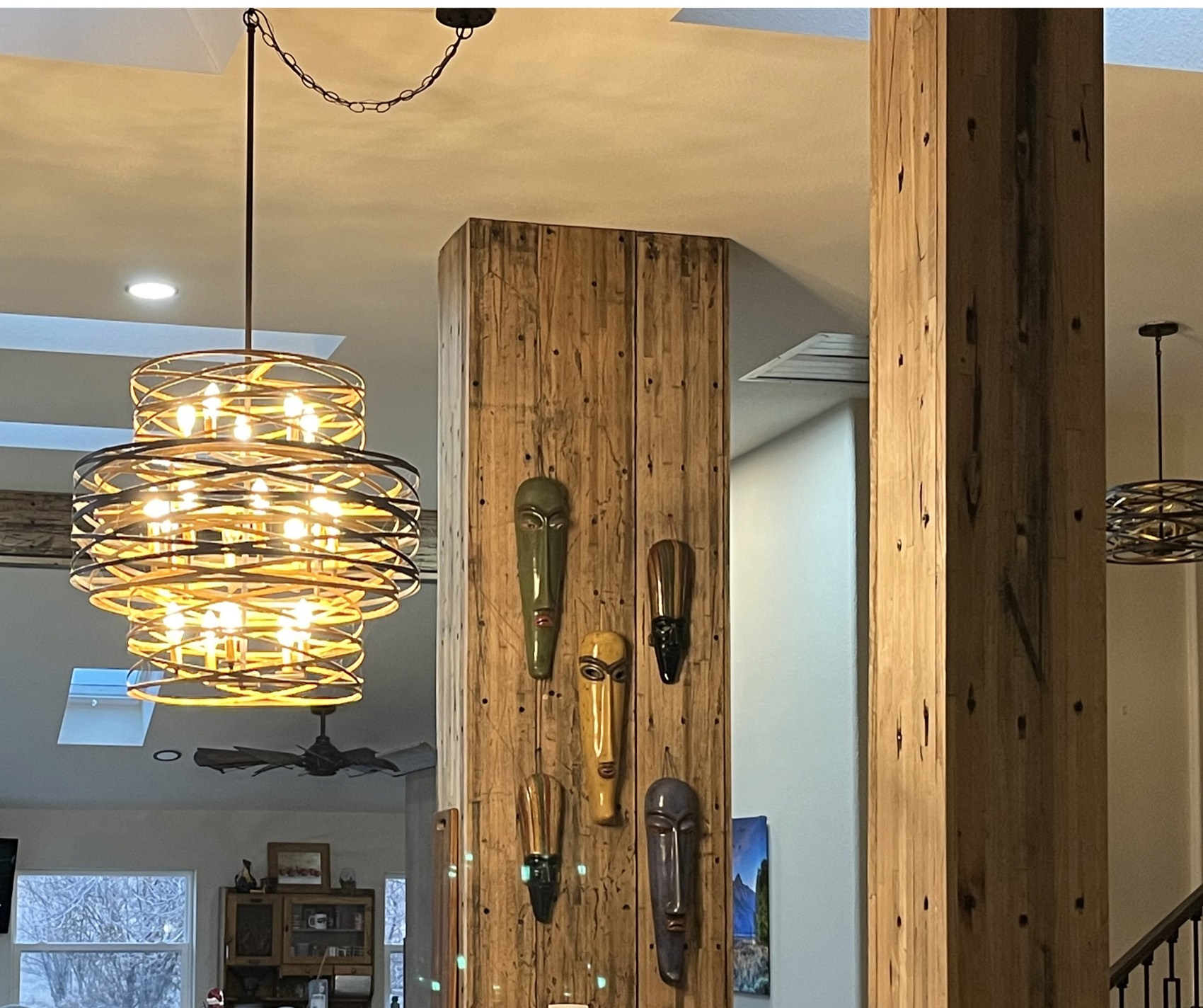 Architectural columns clad in reclaimed hardwood.